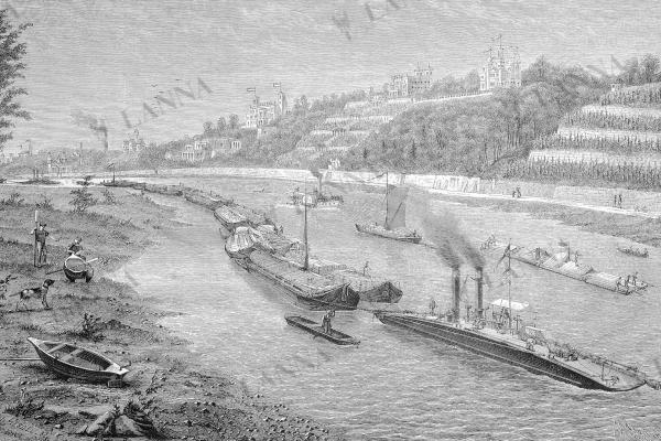 Přeprava nákladu řetězovým parníkem, který táhne vlečné lodě poblíž Drážďan v roce 1882. Archiv NEBE.